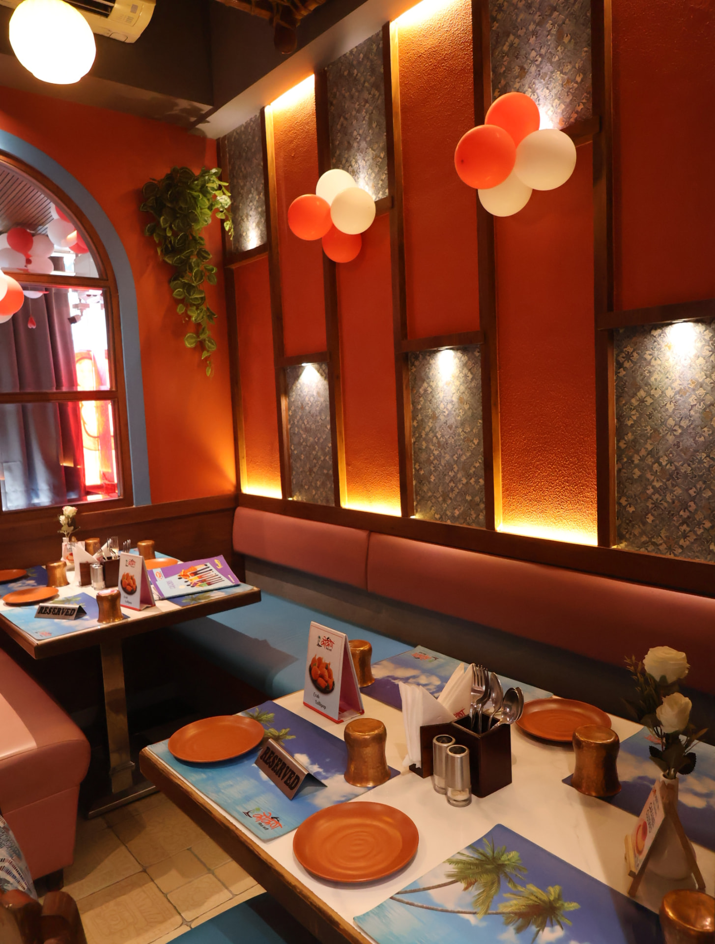 Warm terracotta dining nook at Konkan Fish Curry